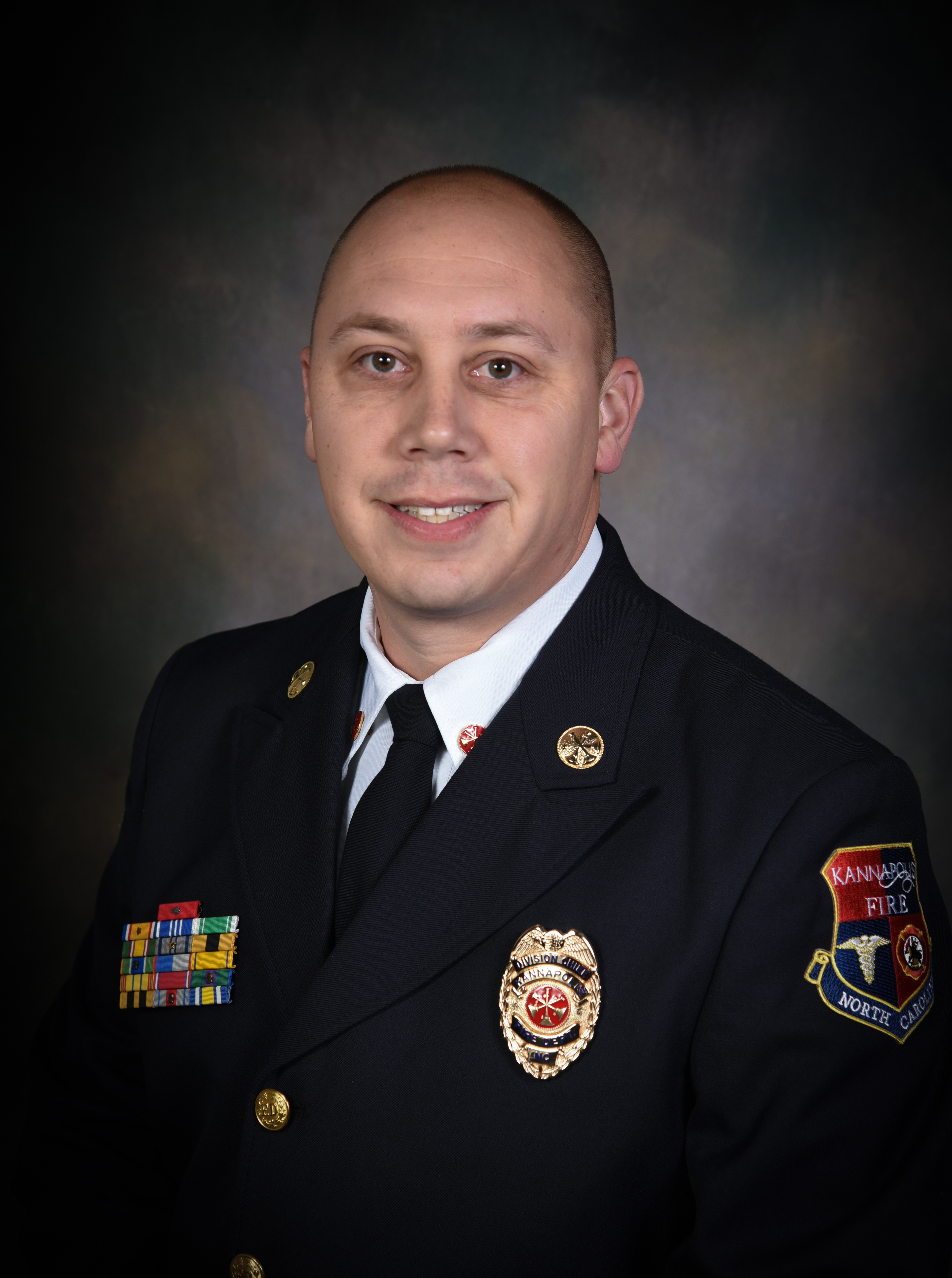 Headshot of Greg Summit in Kannapolis Fire Uniform 